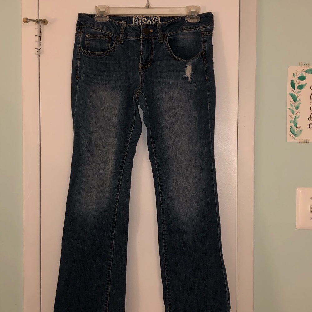SO Medium-wash Mid-rise distressed bootcut jeans